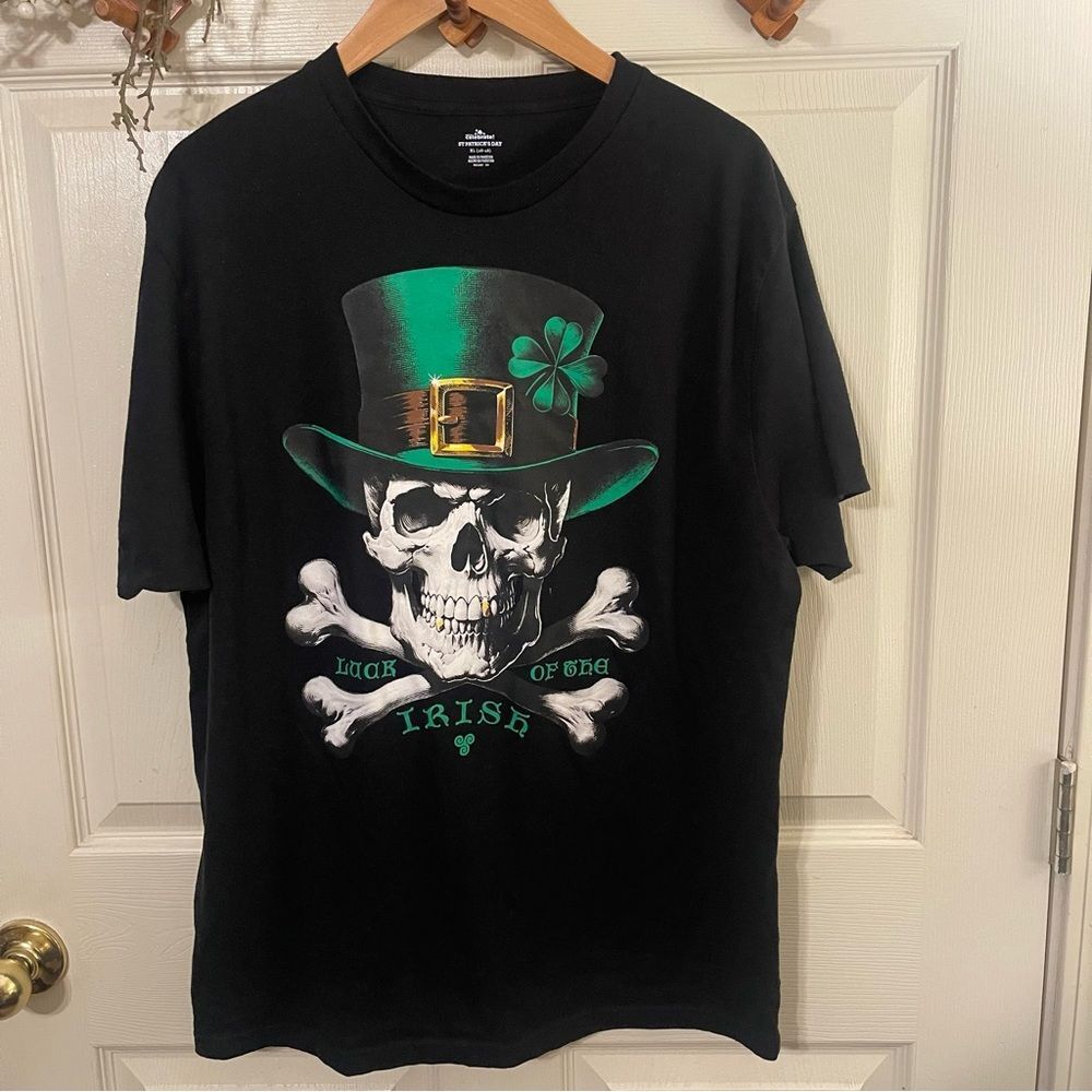 Black Graphic Tee with Skull and Shamrock Design